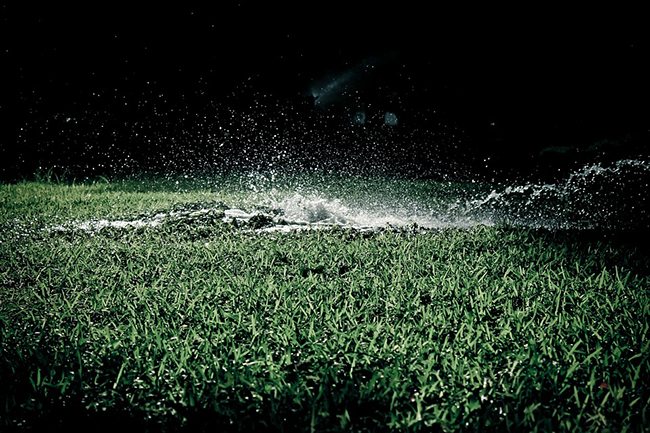 Someone over watering their grass and it's bad for water conservation | H2O Sprinklers